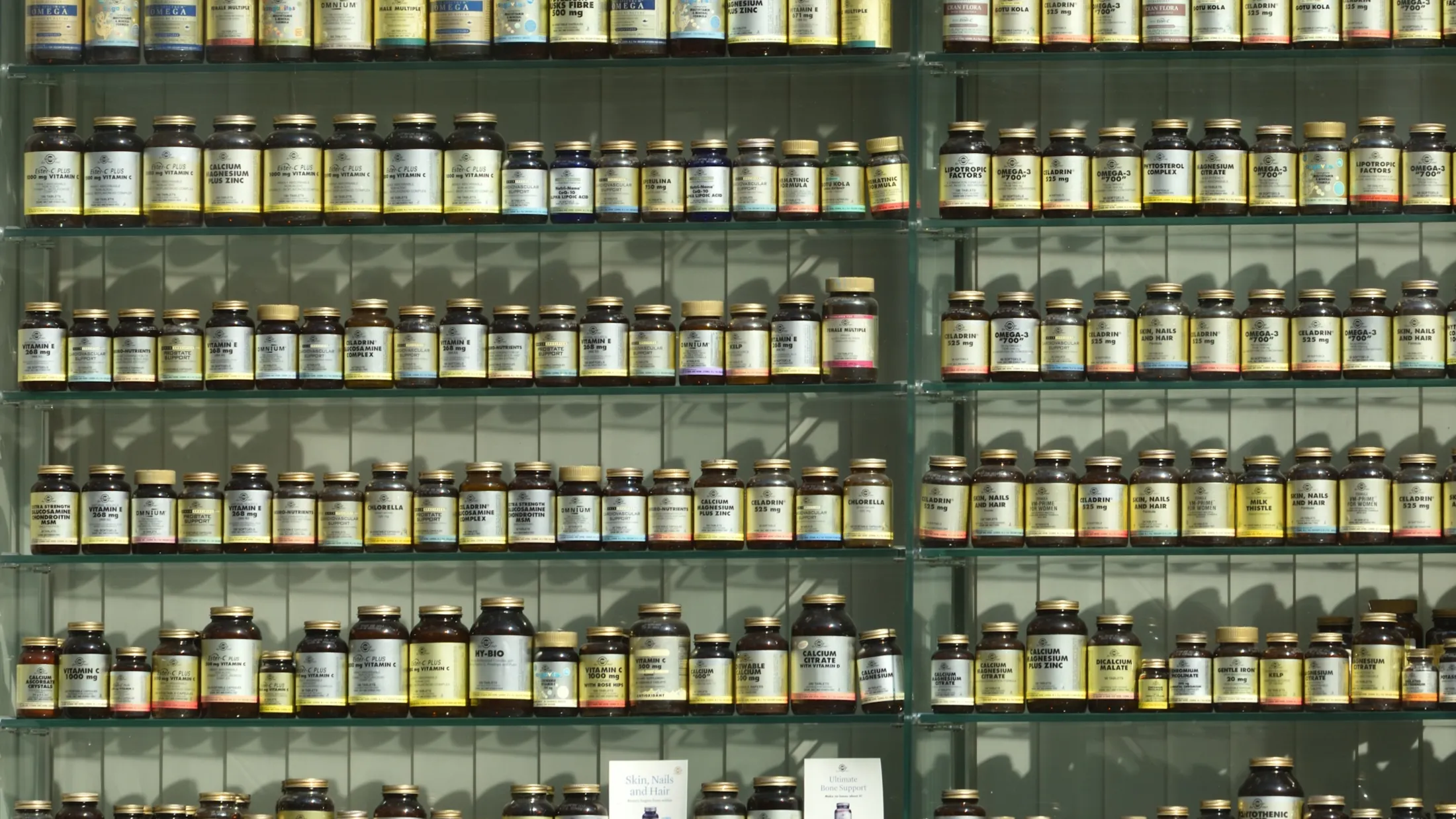 Shelves of supplement bottles